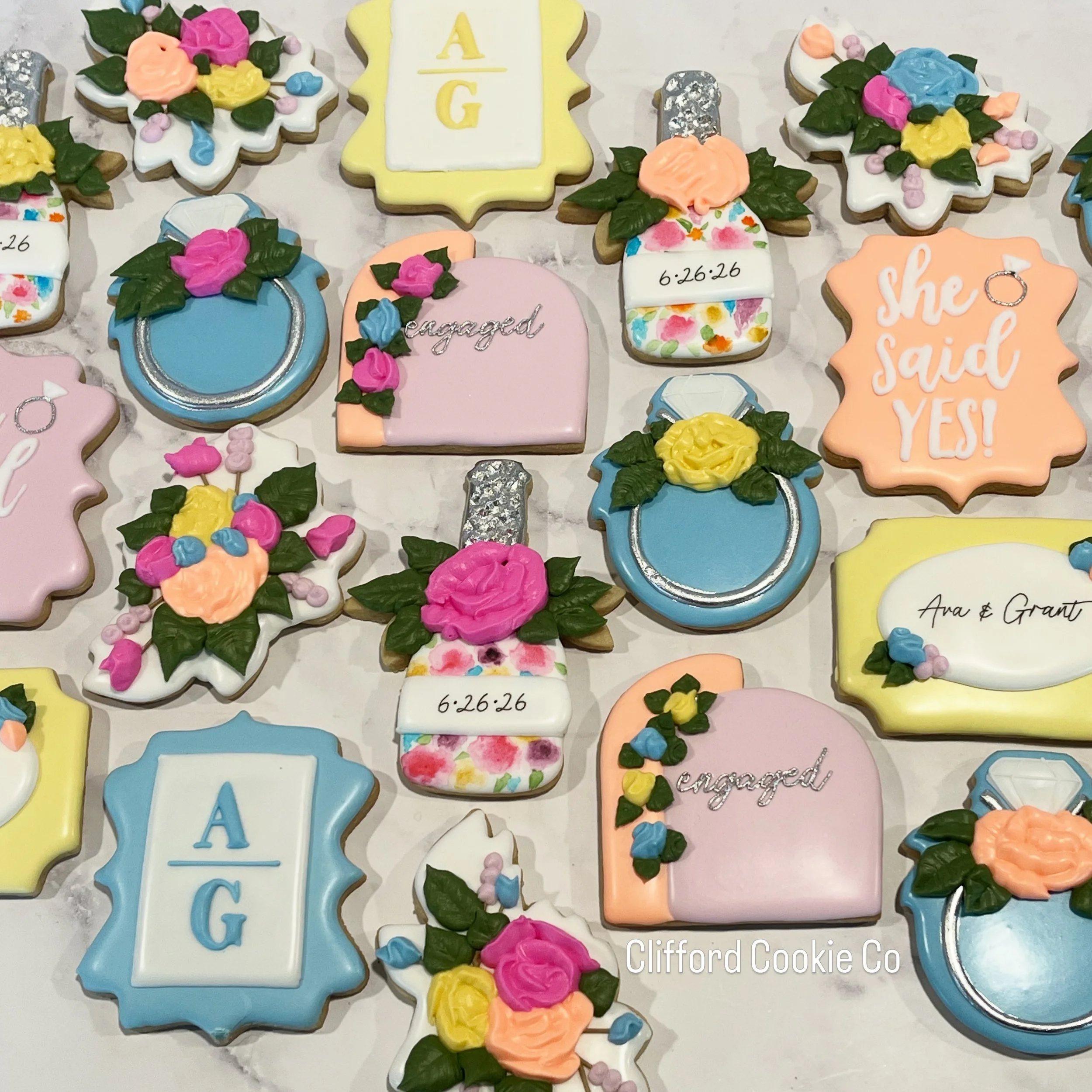 🤩 what a fun engagement set!! 

The colors were SO fun to work with and I love how it all came together 🩷 

#customsugarcookies #engagementcookies #brightflorals #royalicingart