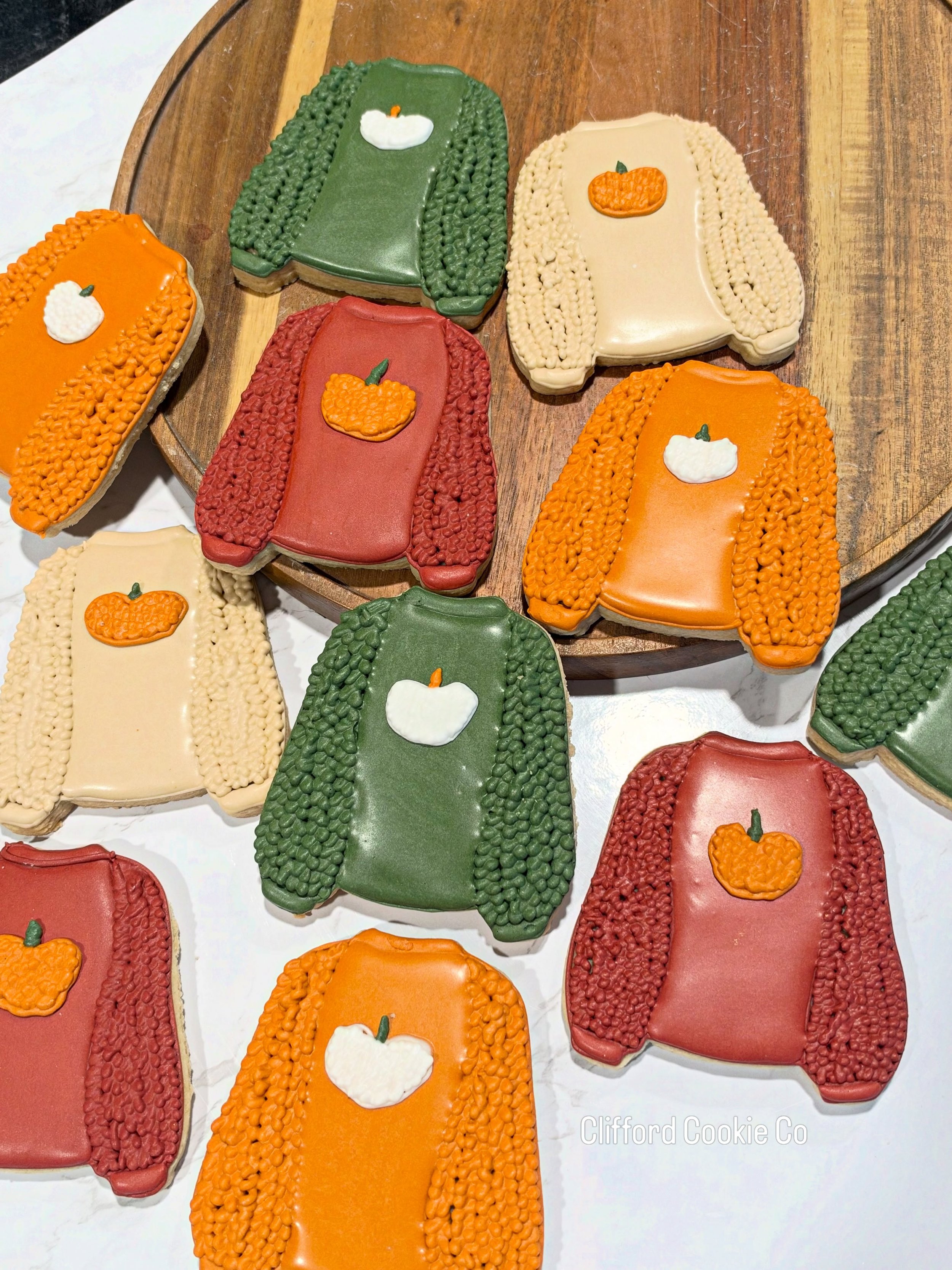 Cute fuzzy sweaters 🍁 

Some funnies while making these&hellip;
My oldest daughter told me the sleeves looked like corn. And my youngest daughter said &ldquo;if they were real sweaters, I&rsquo;d wear it til it was dirty!&rdquo;

#customsugarcookies