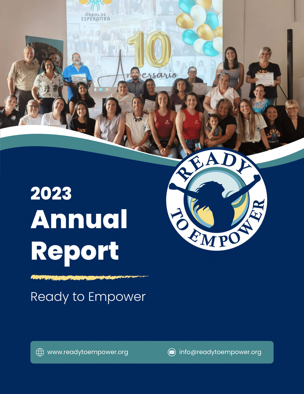 Cover of the 2023 annual report for Ready to Empower, featuring a group photo of diverse people on stage during an event, with balloons and a large screen in the background.