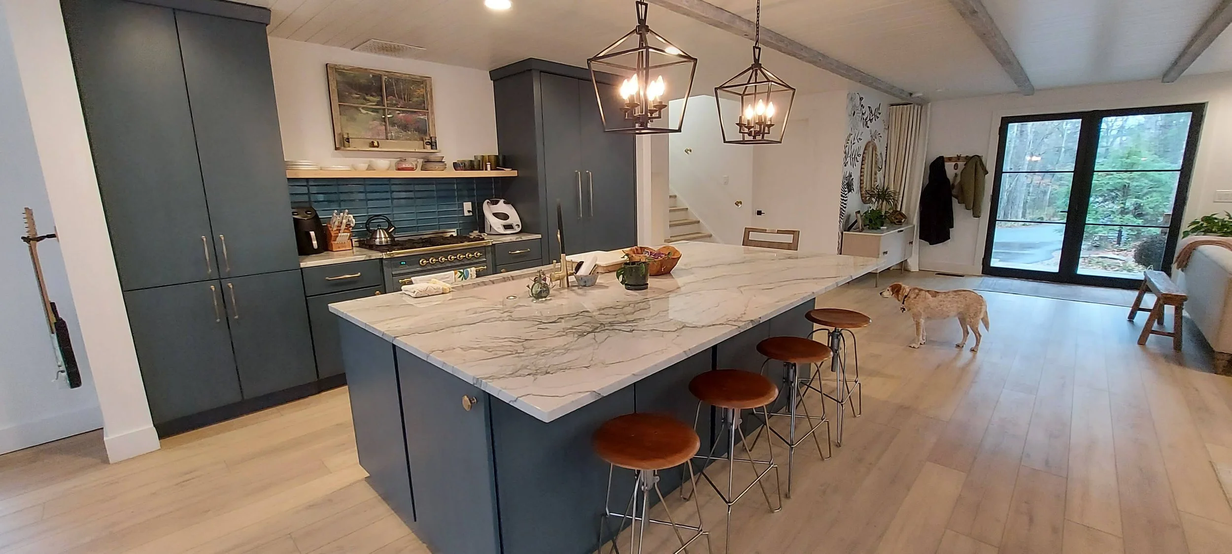 classic marble island with modern lighting