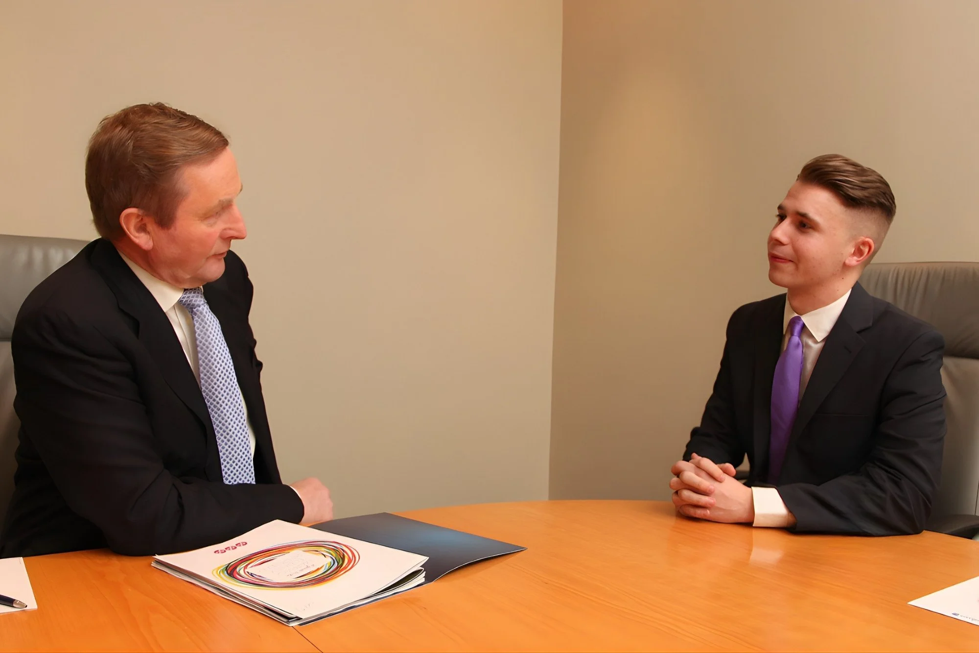 Dale McDermott briefing Irish Taoiseach Enda Kenny on youth policy and governance