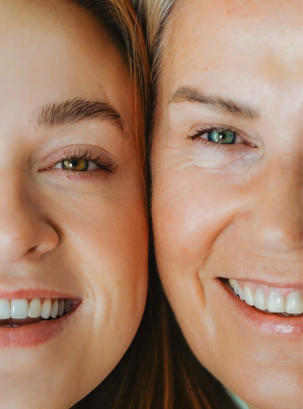 Close-up of smiling woman and man showing their eyes and smiles.