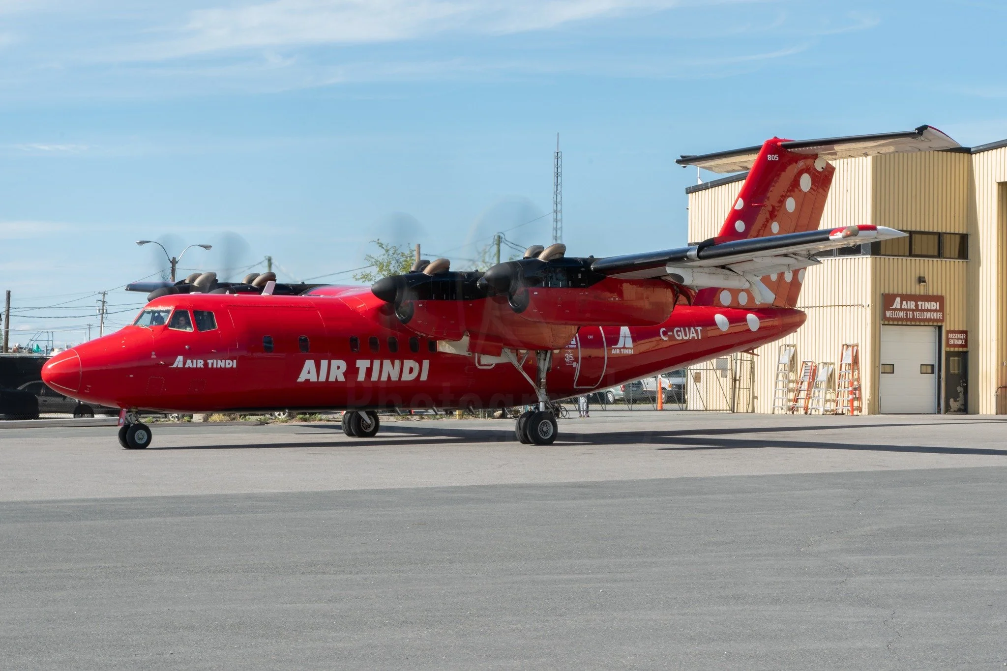 During my trip to Yellowknife in June, I had the privilege of touring Air Tindi's facilities at their Yellowknife base.

Photographed is one of their de Havilland Canada DHC-7s, C-GUAT heading out for departure for another flight in Canada's Northwes