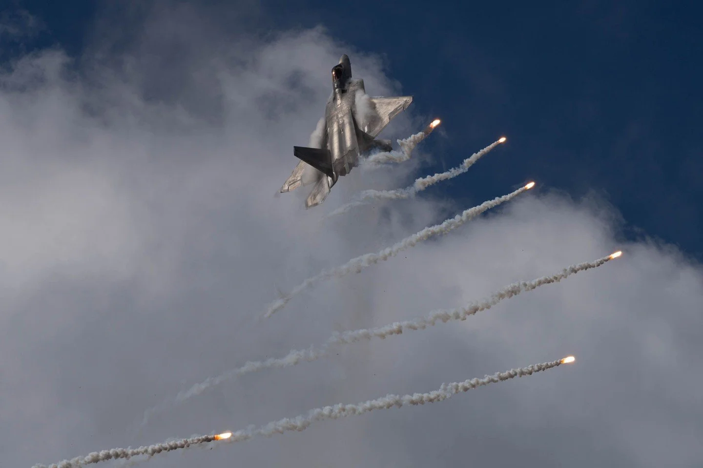 My last trip abroad for aviation photography was anything but subtle.

An F-22A climbing steeply over NAS Oceana, flares deployed as part of the display sequence.

&mdash; United States Air Force Lockheed Martin F-22A 02-4036 &middot; NAS Oceana Air 