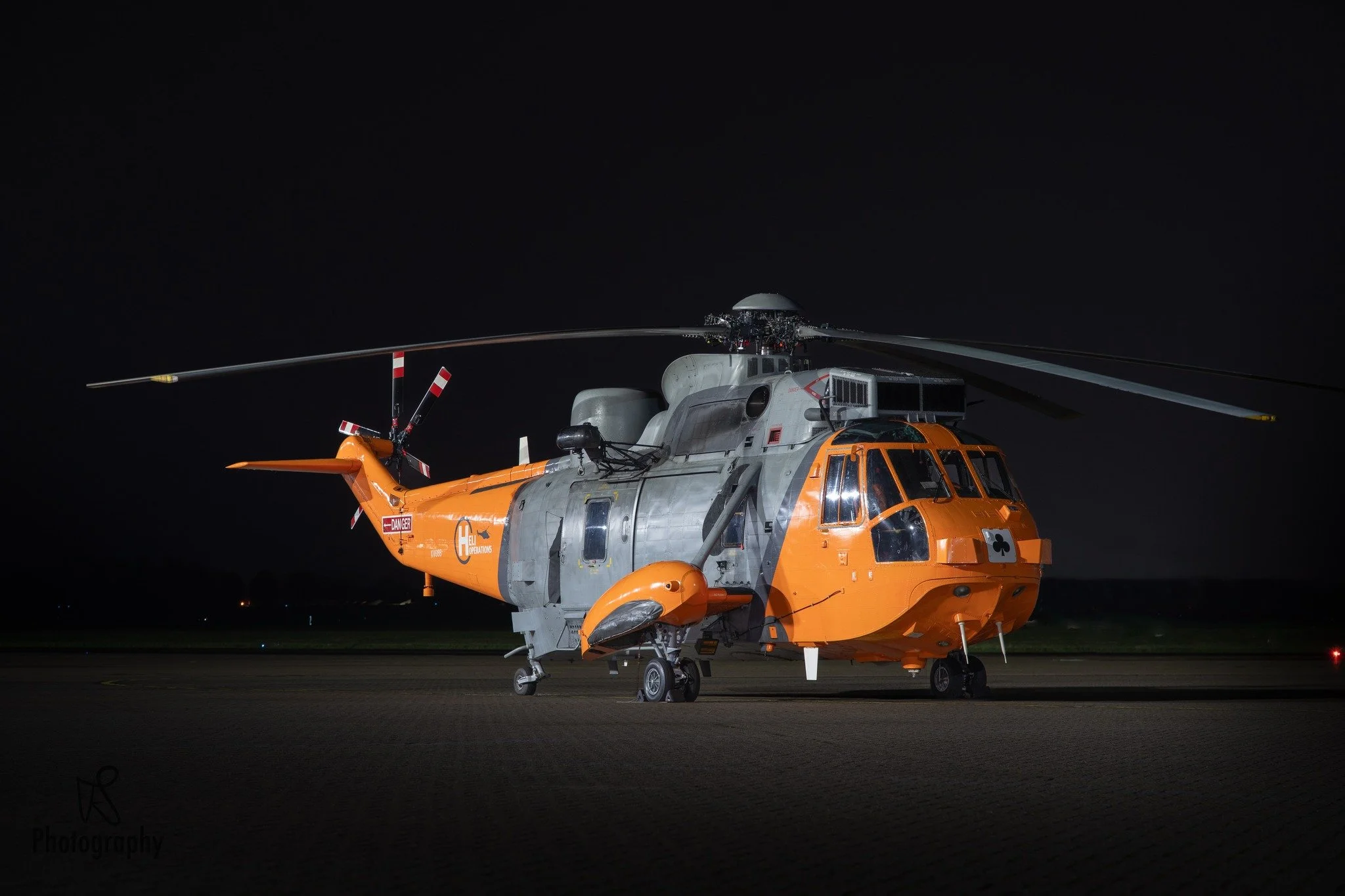 It's always a pleasure to photograph a classic helicopter, and it doesn't get much more iconic than a Sea King!

@heli.ops immaculate Westland Sea King HU.5SAR XV666 is sat at @rafnortholt during Northolt Nightshoot XXX. 

#aviation #aviation4u #avia