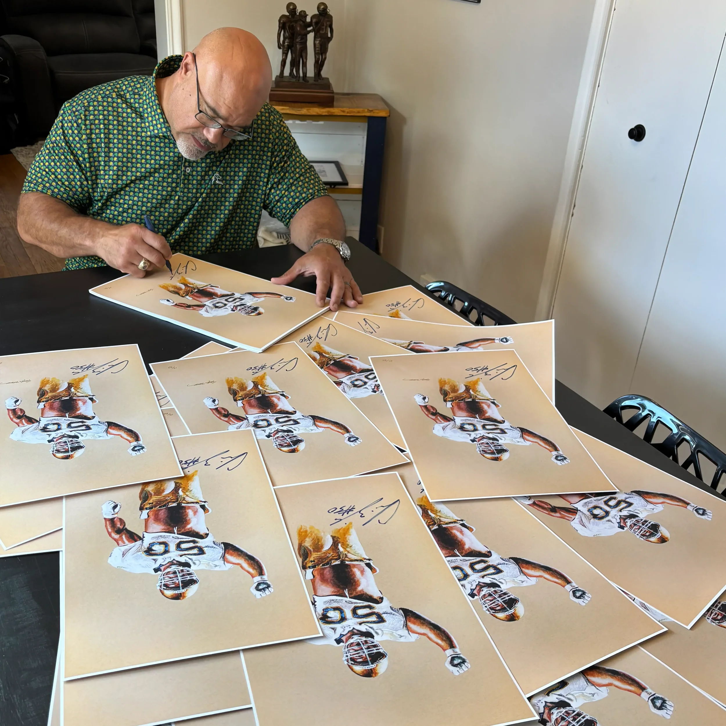 Zorich signing prints website.webp