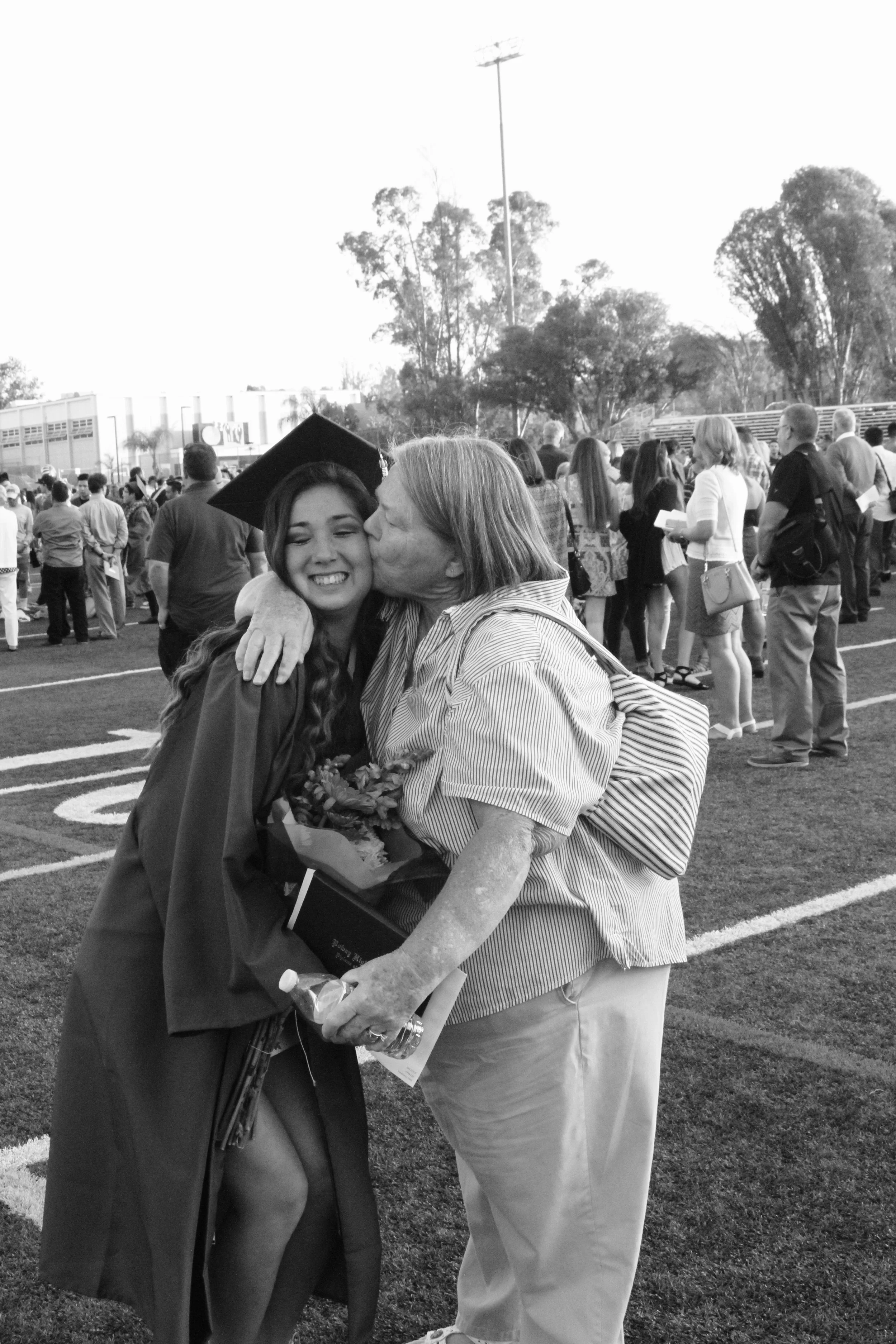 Bride in Kansas City with romantic wedding hairstyle by Cheyenna Cahoon
