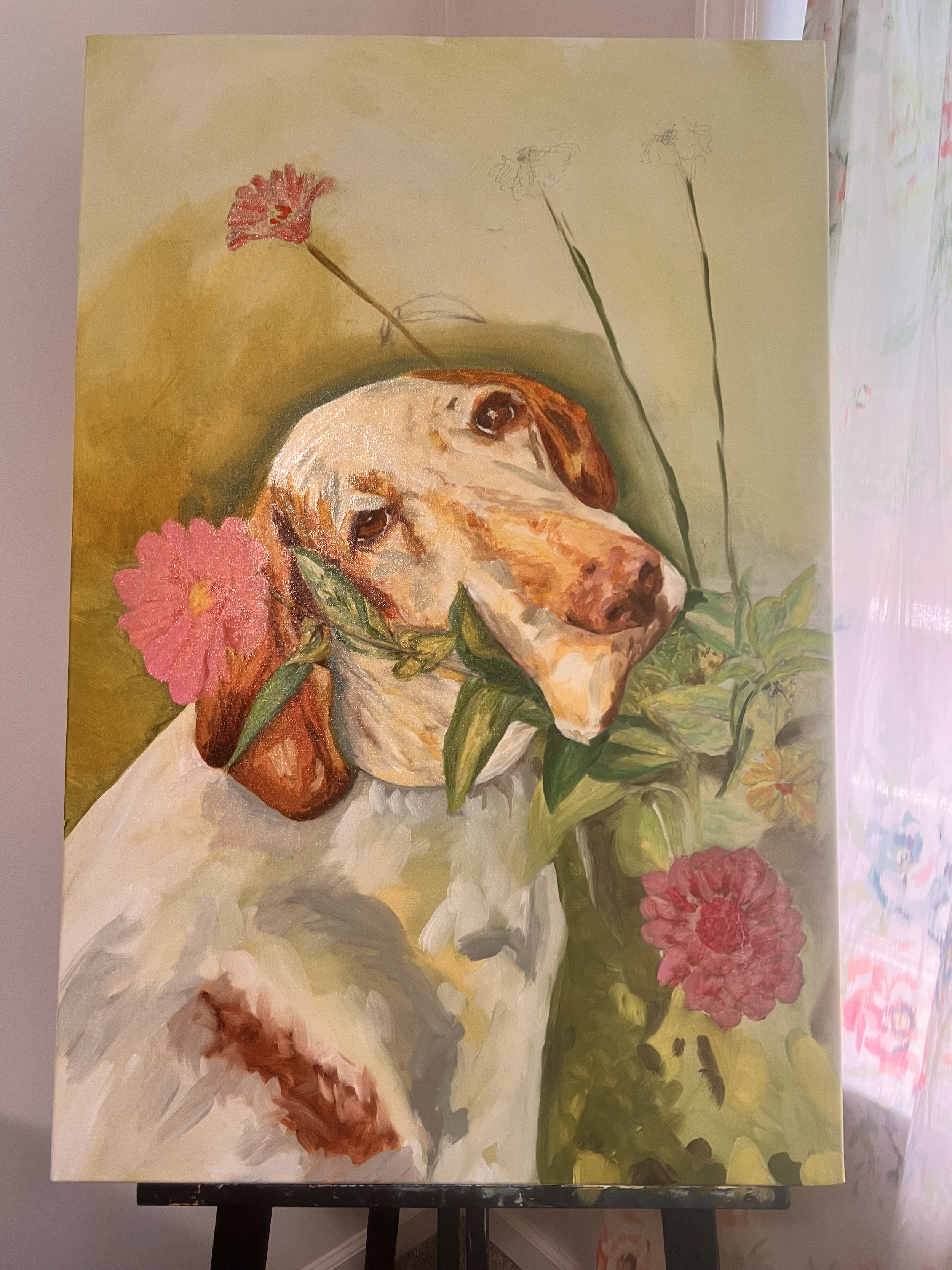 A painting of a dog with a flower in its mouth, surrounded by various pink and red flowers and green foliage.