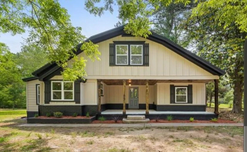 Oranssi technician working on a roof project