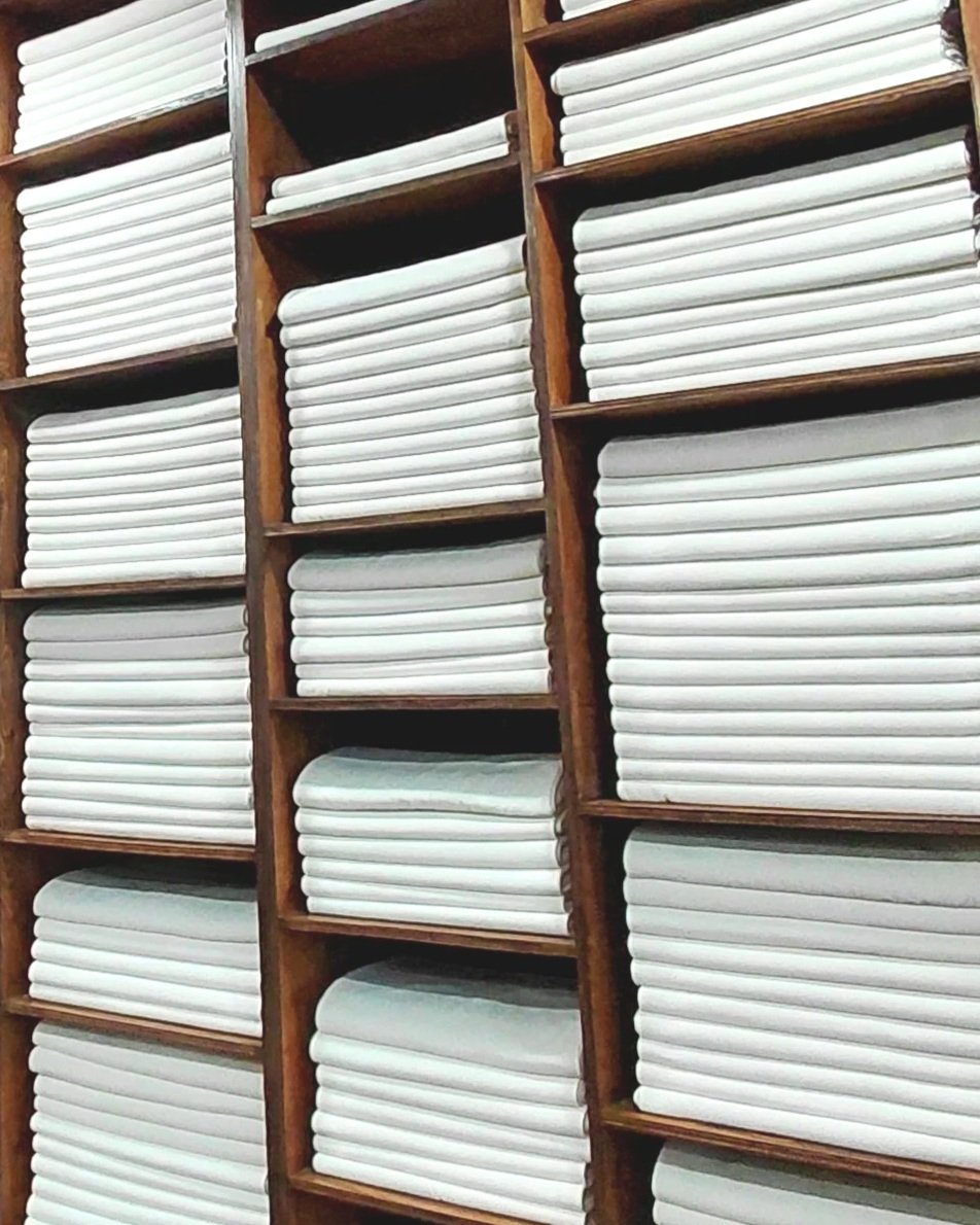 Stacks of soft white sochang fabric made in Ganghwa. Sochang is the ultimate Korean household cloth with centuries of history.