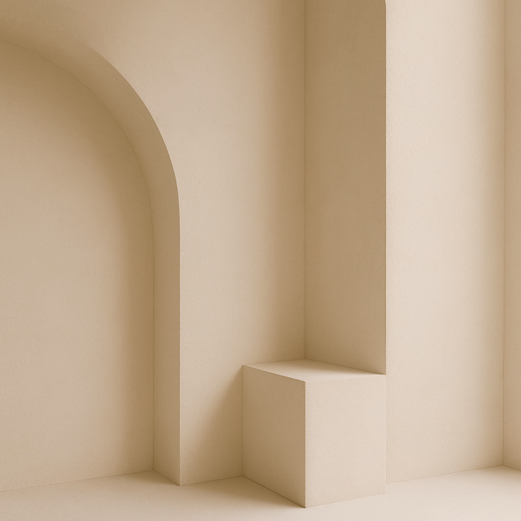 Minimalist cream-colored built-in geometric shelves with an arched opening on the wall.