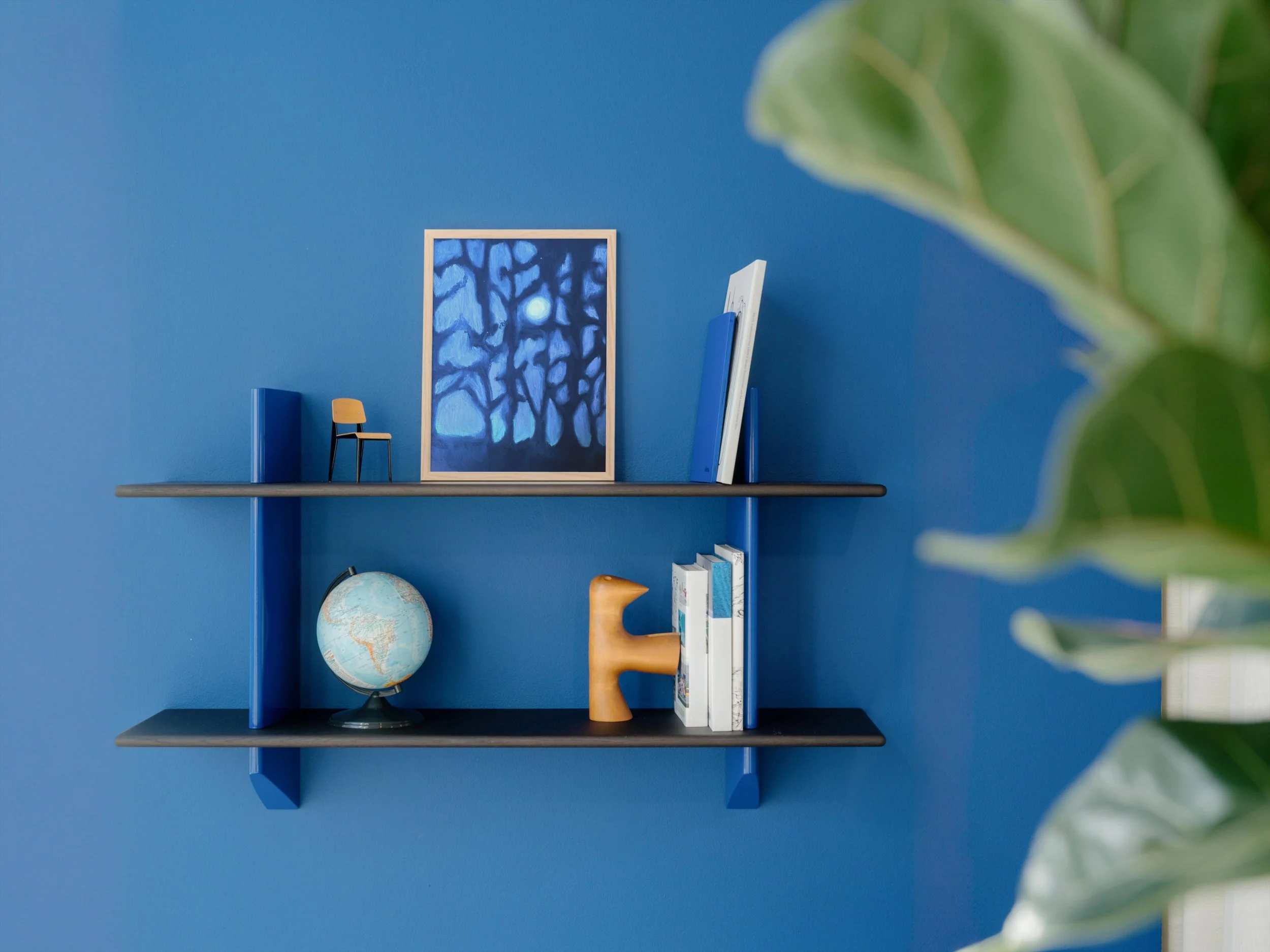 mockuuups-a4-mockup-in-a-modern-blue-wall-decor-setup.jpeg
