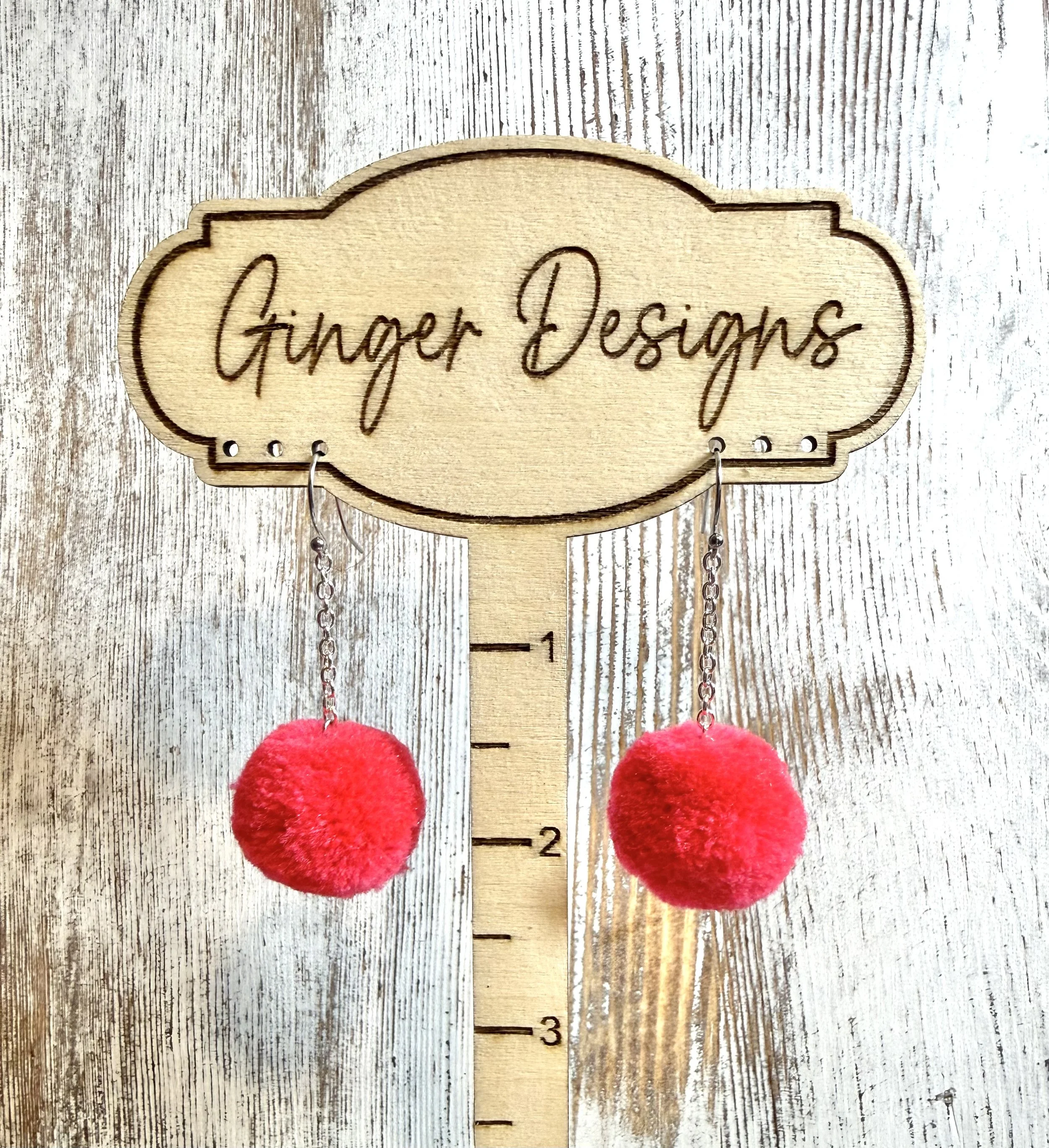 pink pom pom earrings