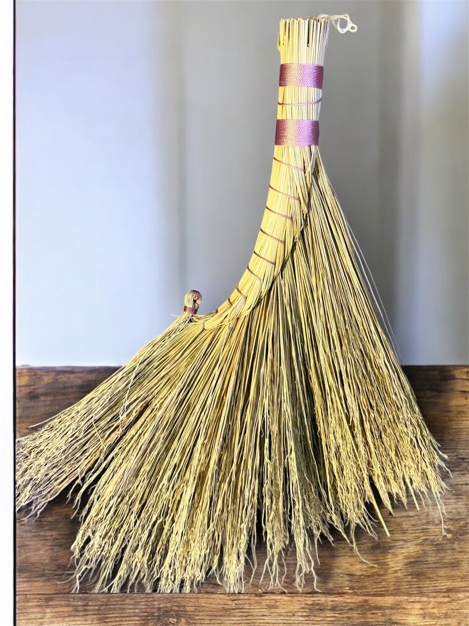 baby pink and natural colored broomcorn rooster tail