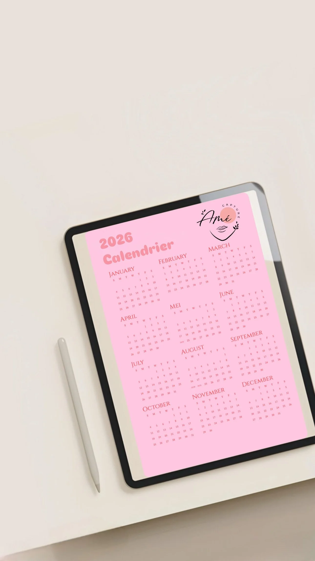 Calendrier 2026 rose avec le nom Amé Capteur et un logo de visage féminin