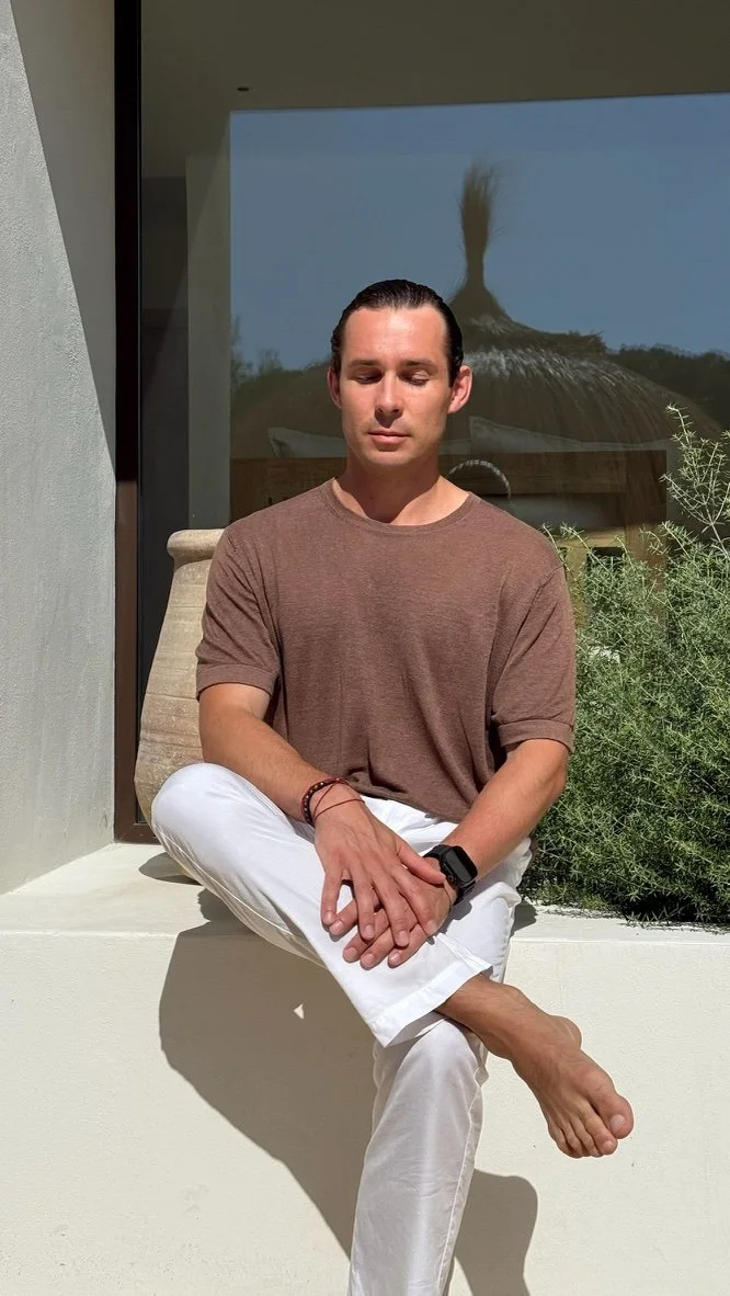 Tarás, certified KAP facilitator and co-founder of KAP London, seated in meditation outdoors