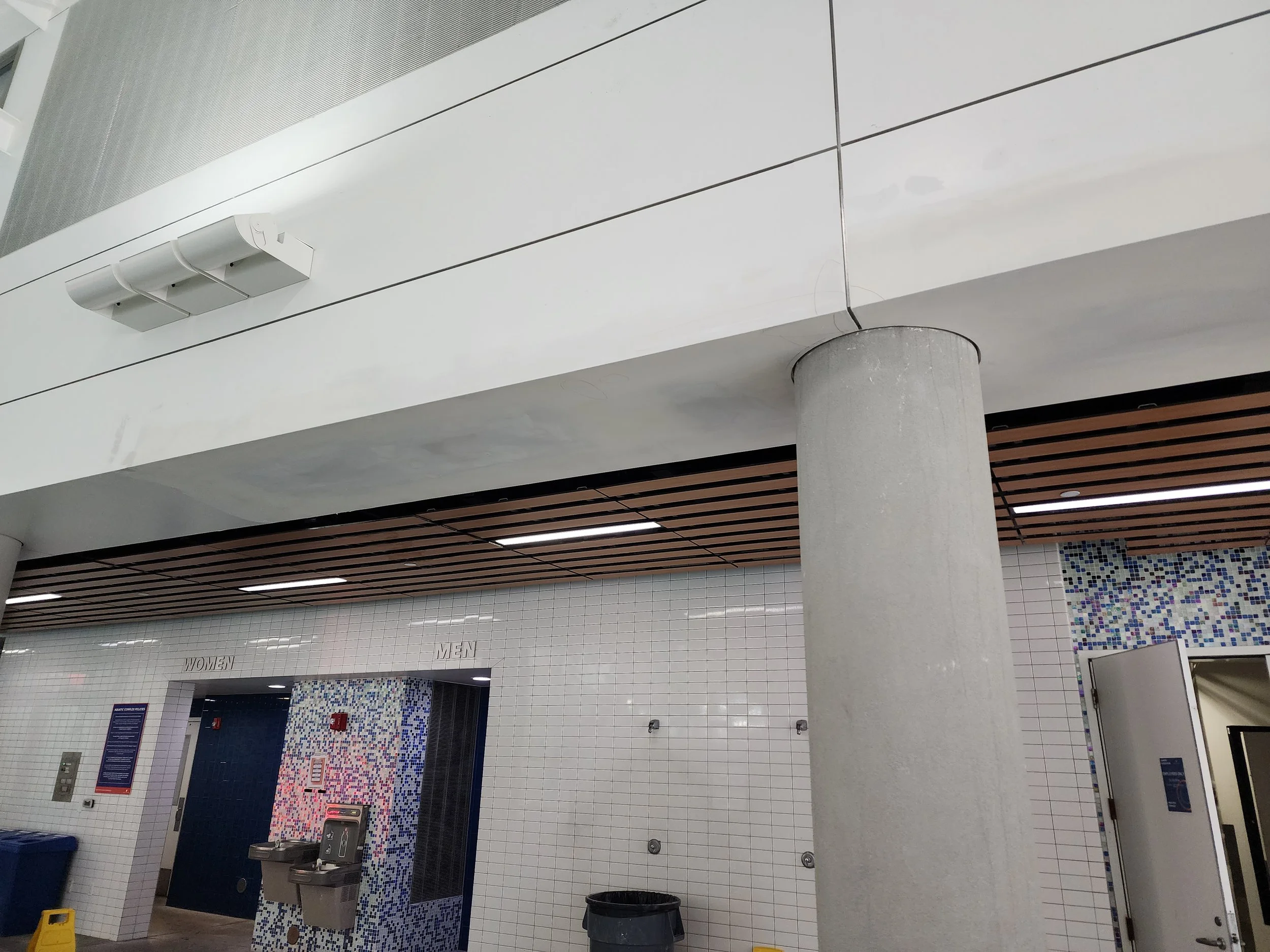 Completed commercial pool ceiling renovation by Evolution Drywall & Restoration