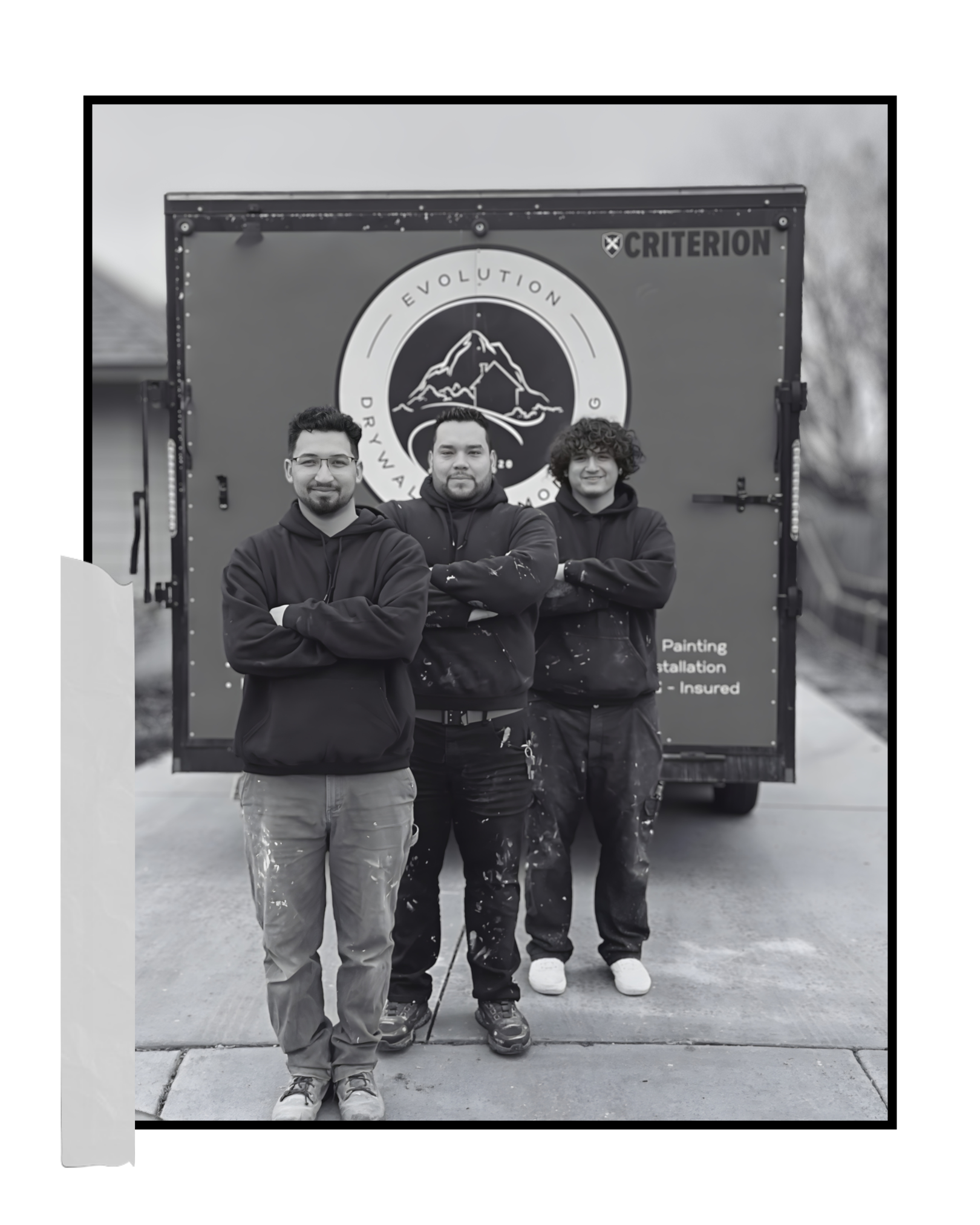 Evolution Drywall & Restoration crew in front of company trailer serving the Treasure Valley