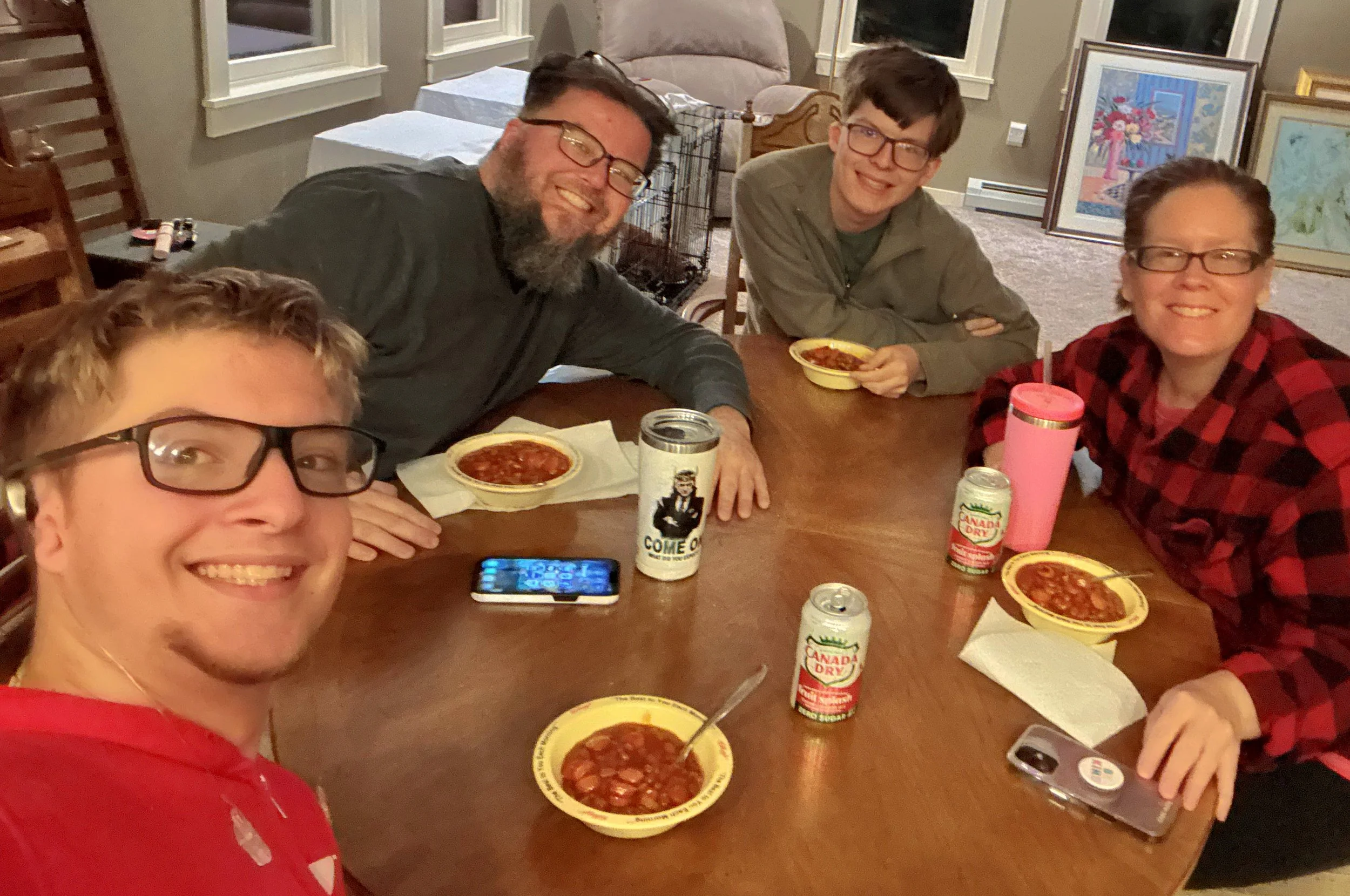 A family sitting around the dinner table.