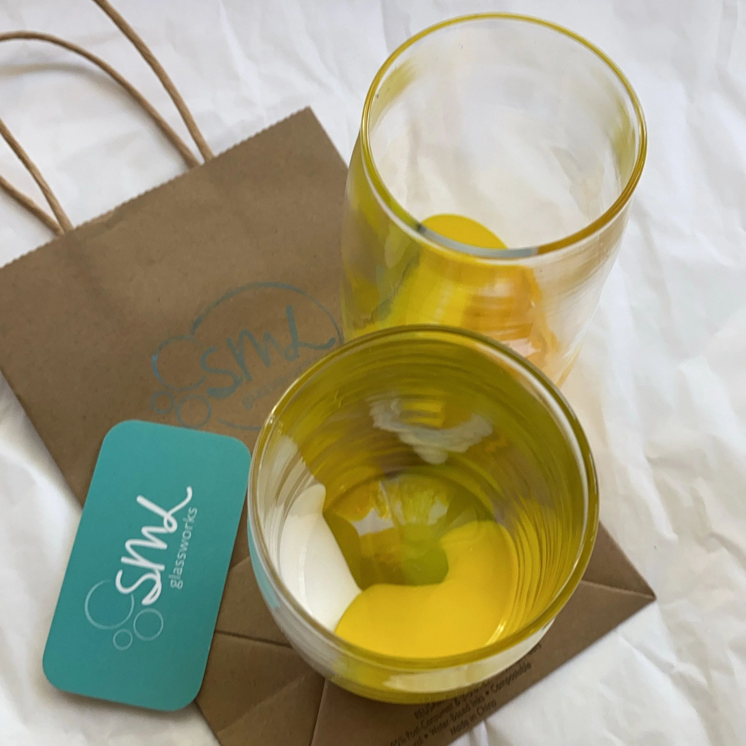 Close-up of a  glass with yellow Colour POP cups