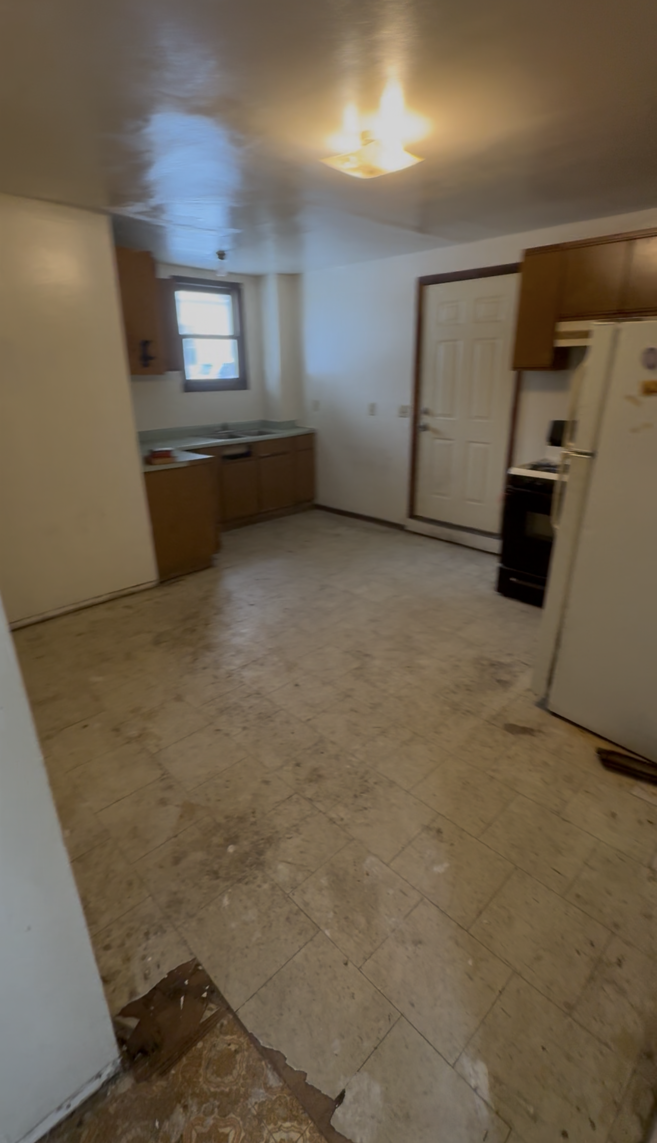 Kitchen & Connecting Space — before renovation in Woodstock, Illinois