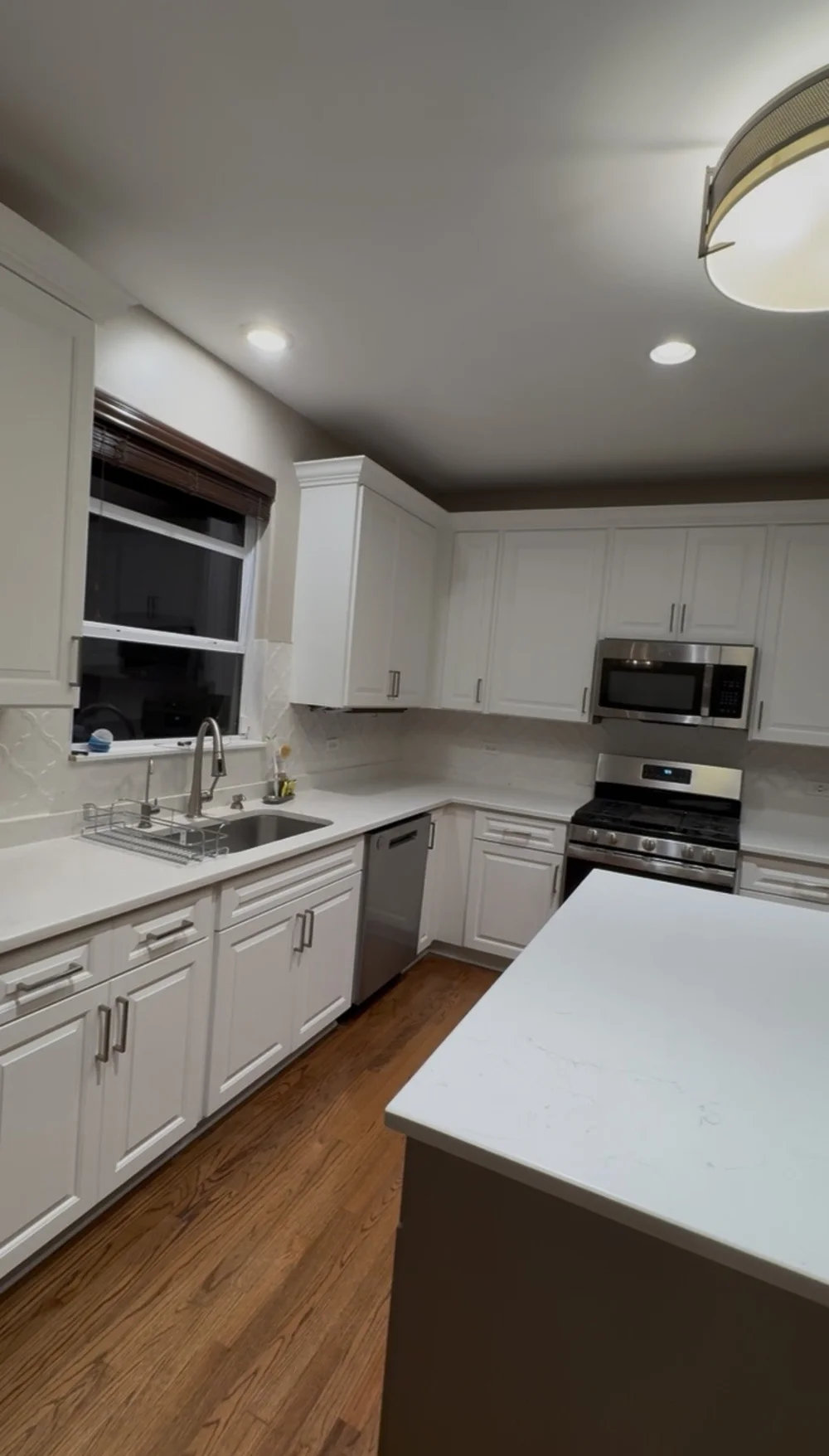 Finished kitchen remodeling project with updated cabinetry and surfaces