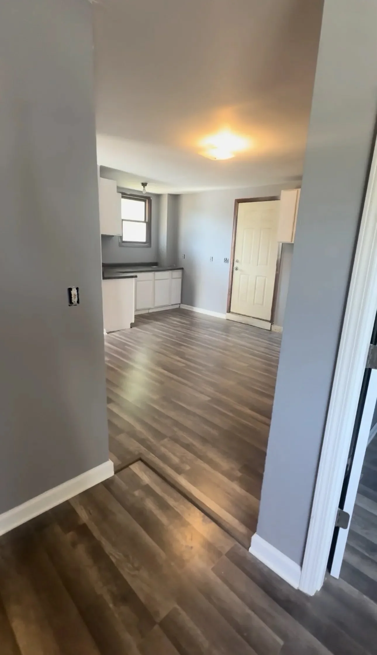 Renovated Kitchen & Connecting Space — after renovation in Woodstock, Illinois
