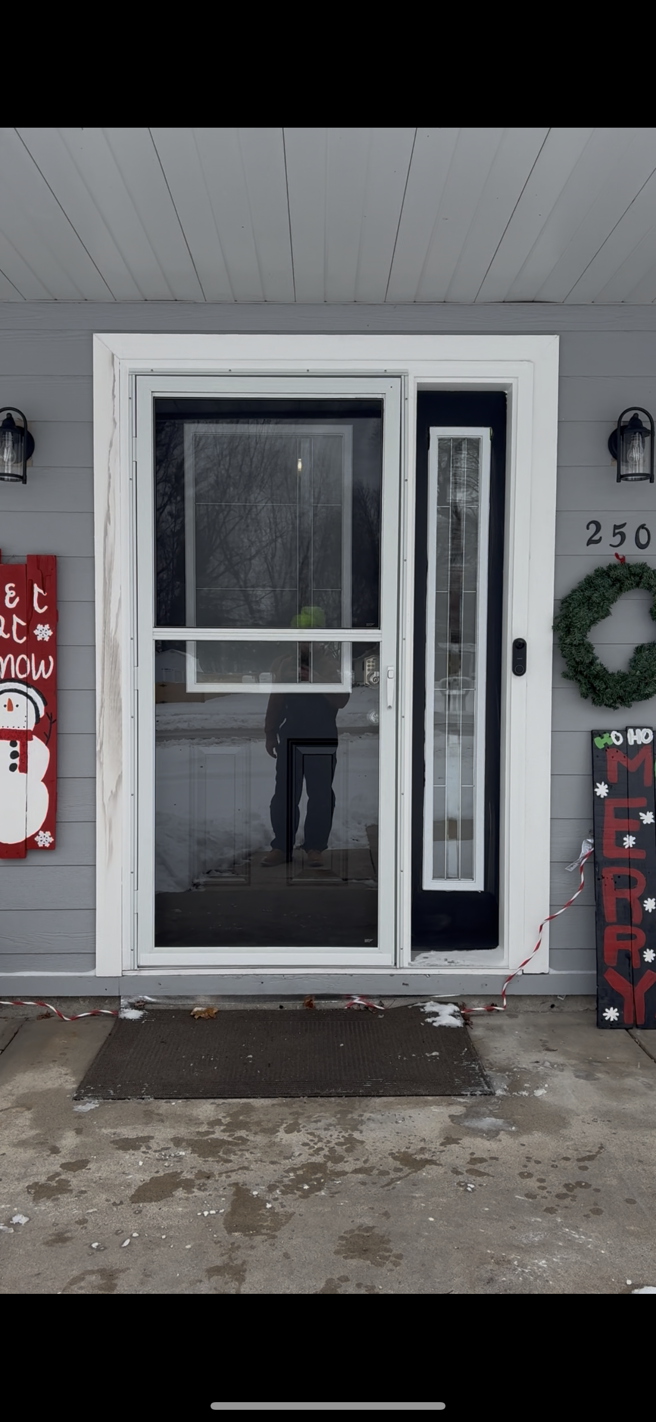 New front entry door with storm door installed in Marengo Illinois