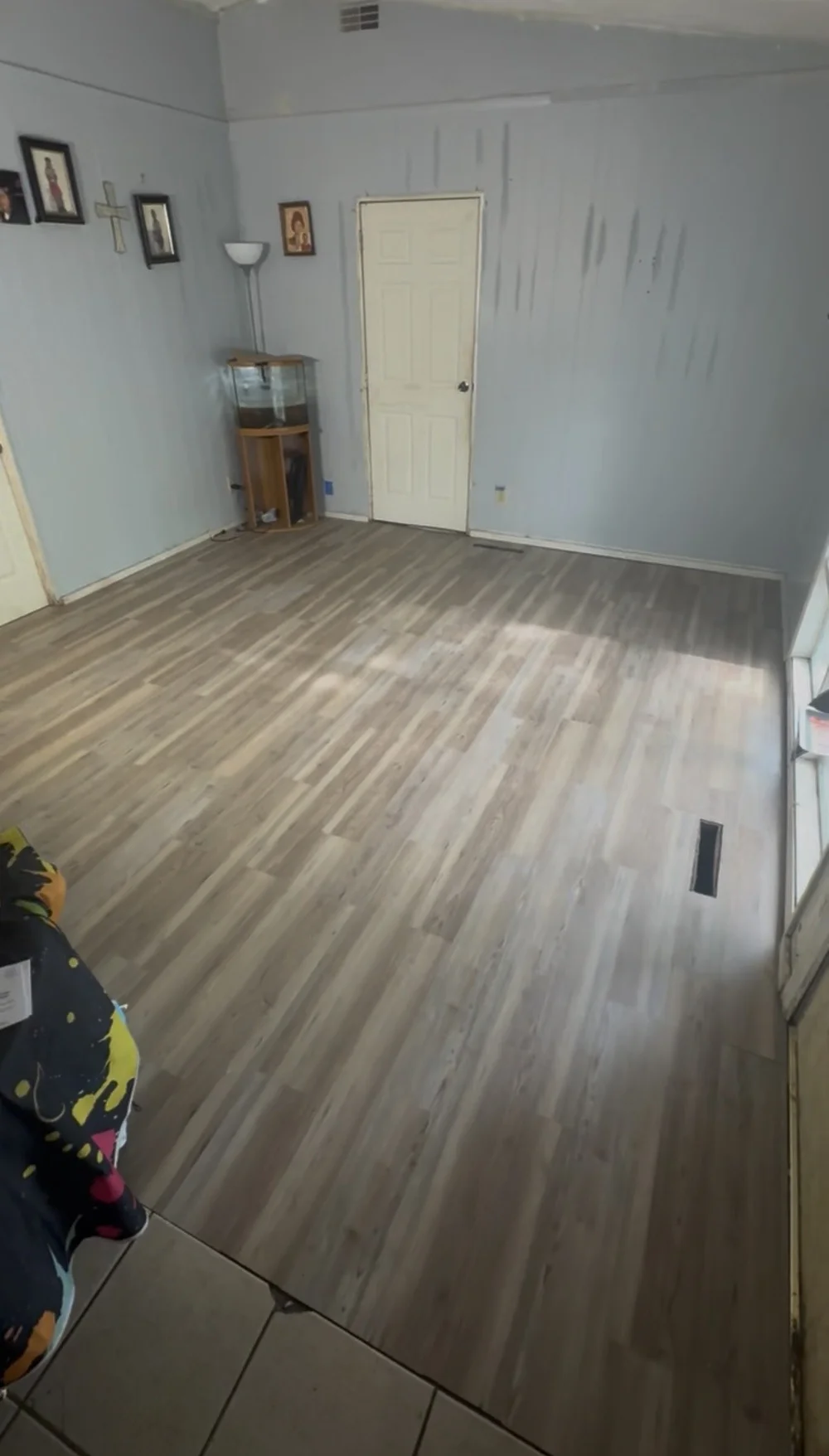 After photo of completed gray plank flooring in Rockford Illinois