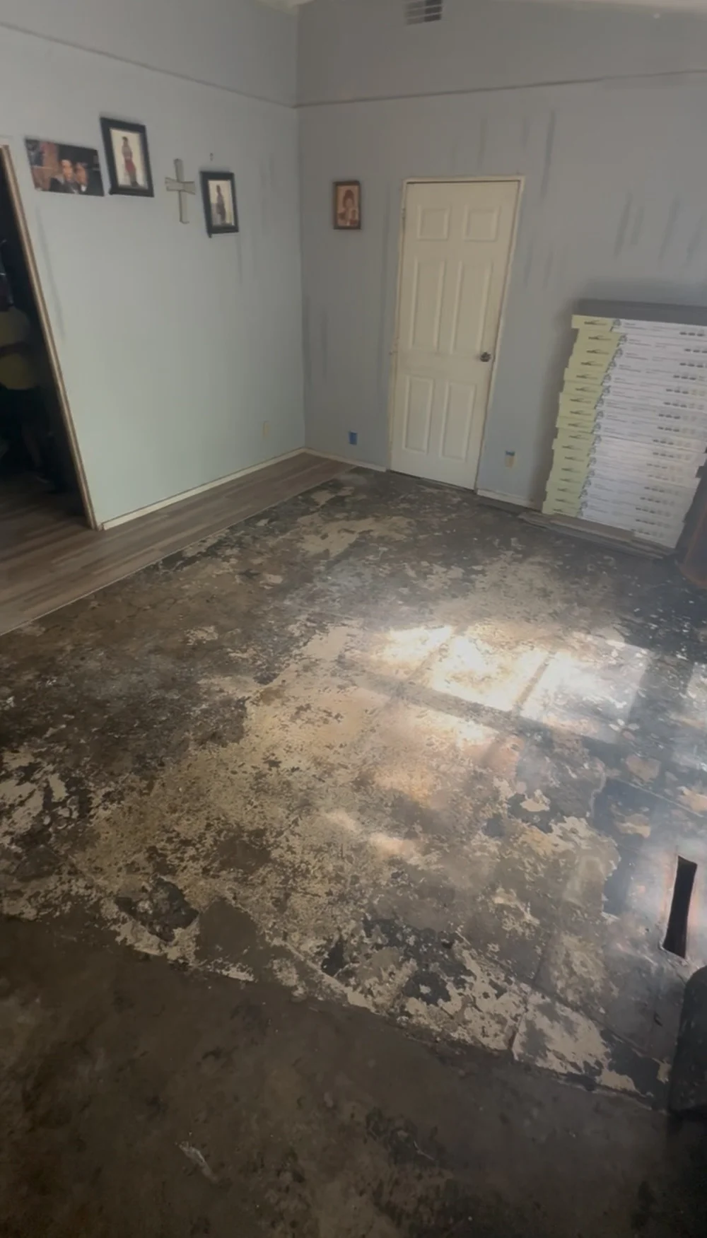 Before photo of damaged exposed floor during a Rockford Illinois flooring renovation