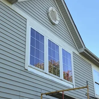 Exterior view of the upper windows and surrounding trim