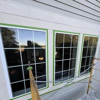 The tall window arrangement viewed from inside the home