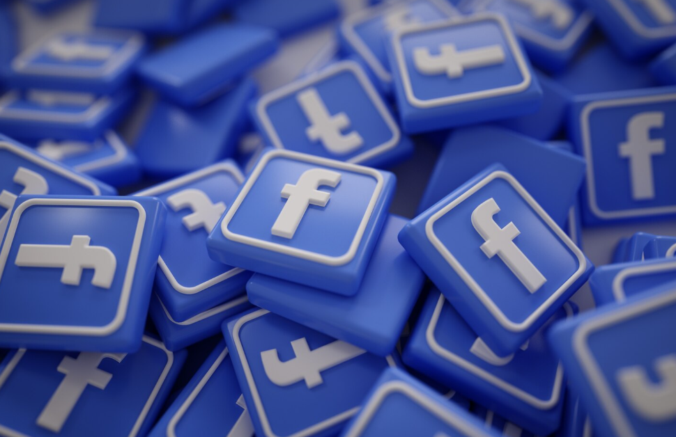Numerous blue Facebook logo buttons with white 'f' symbols stacked together.