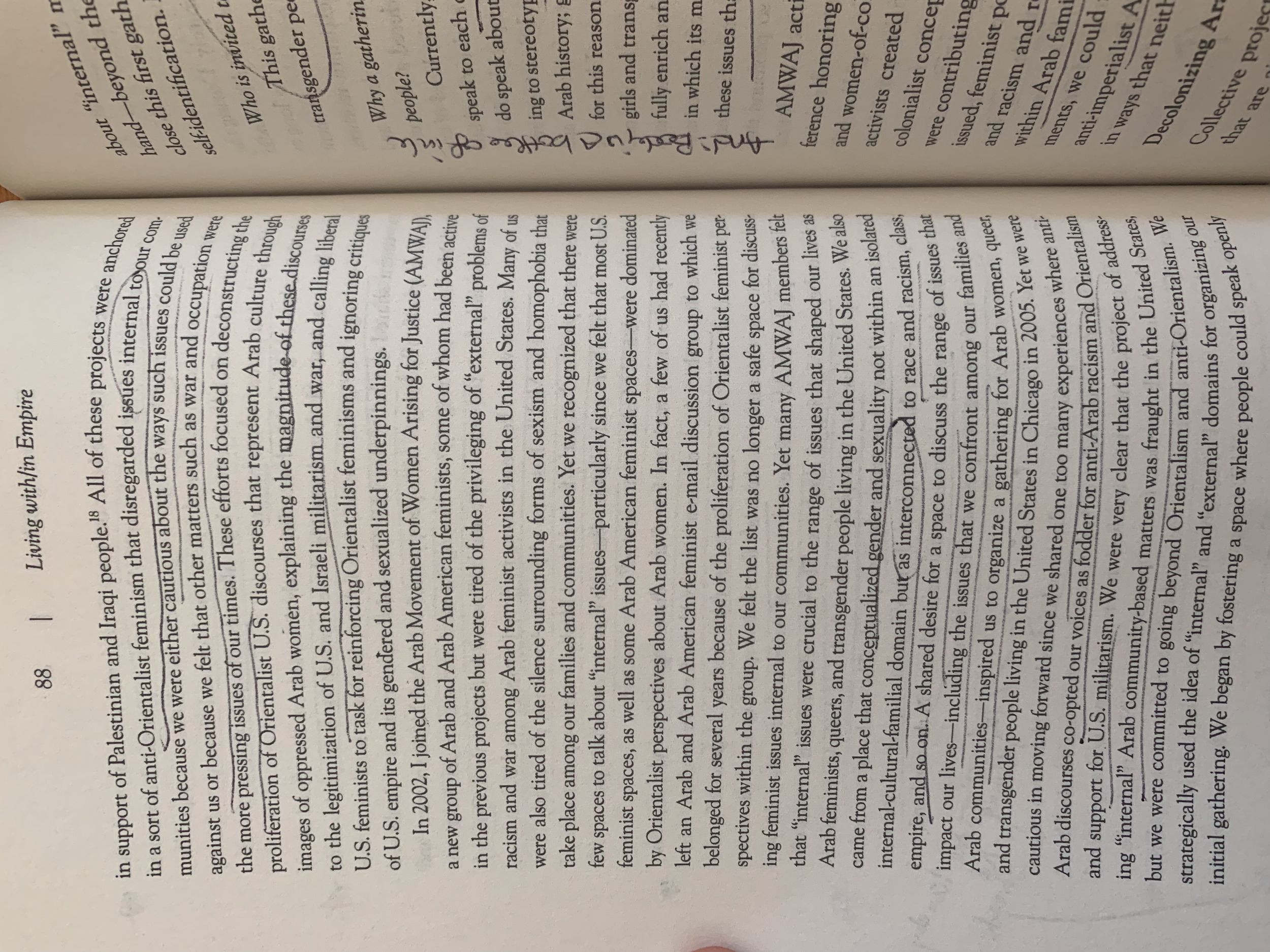 A page from a book with dense text and handwritten notes in the margins.