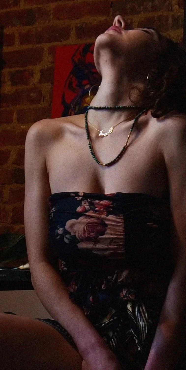 Geometric drawing of an outline square with sections divided by vertical, horizontal, and circle lines.