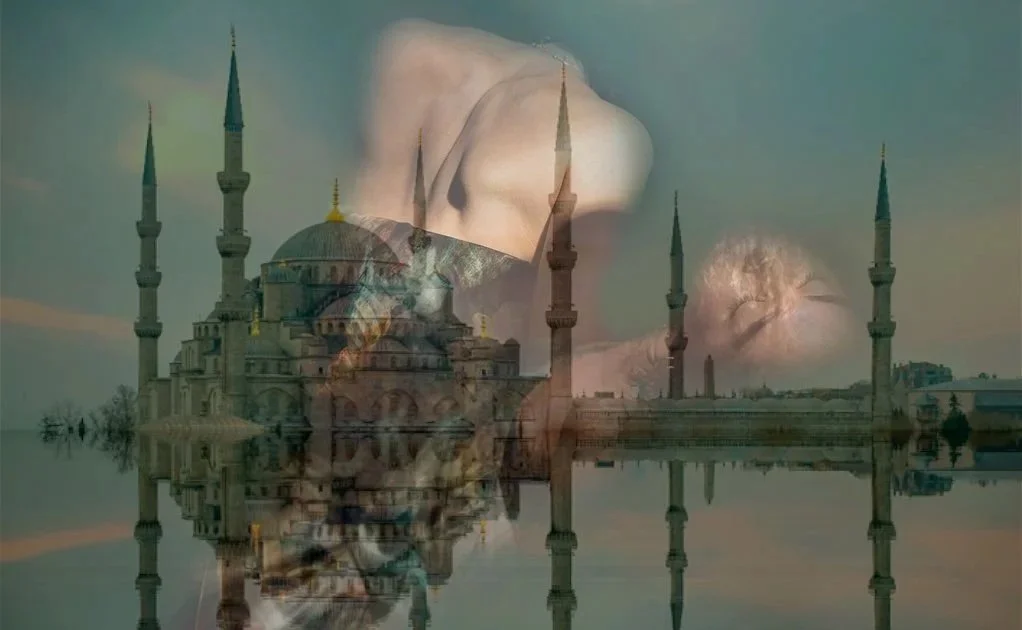 Double exposure of a mosque with four minarets and a woman's face with curly hair, blending into the scene.
