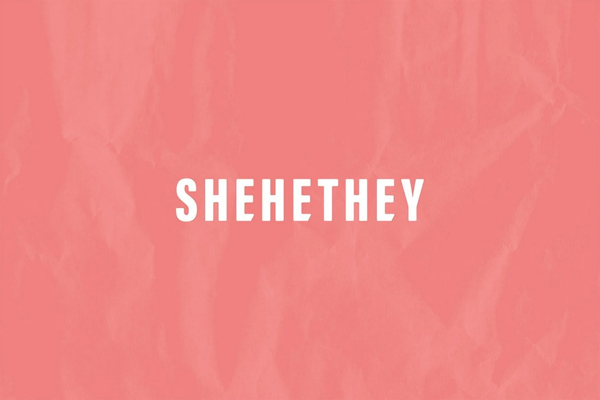 Pink textured background with white text reading 'SHEHETHEY' in the center.