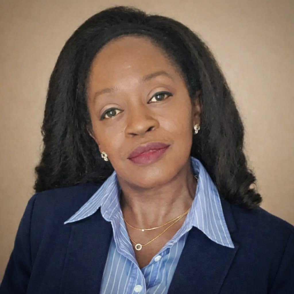 Tisch Cistrunk-Parmelee in a navy blazer and blue button-down shirt with white stripes