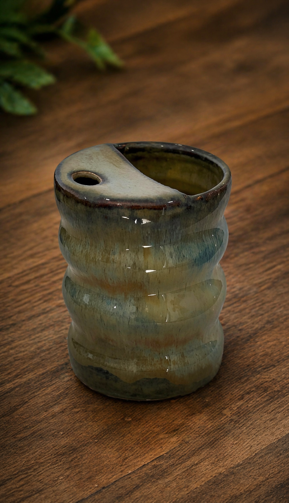 A ceramic bubble travel tumbler