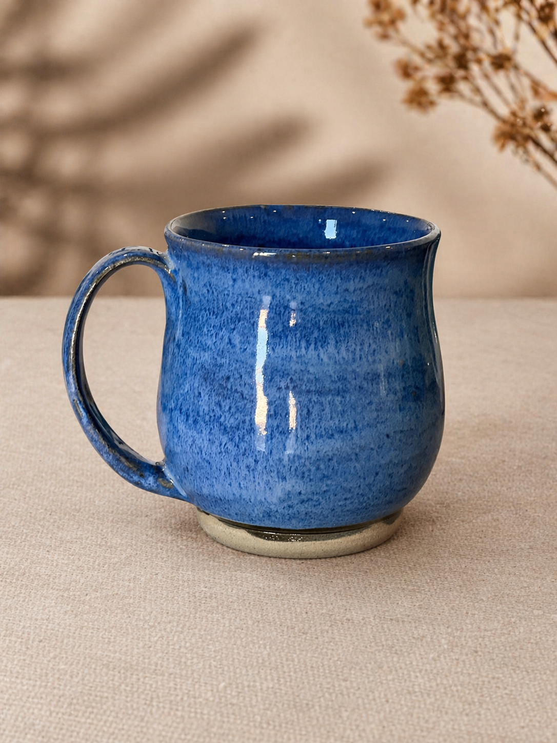 A blue ceramic mug 