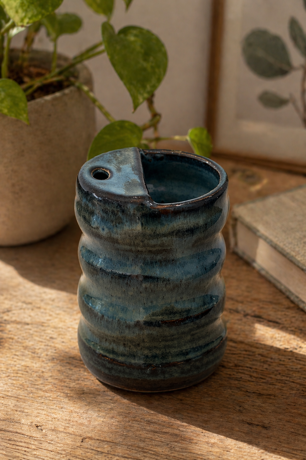 A handmade ceramic travel mug