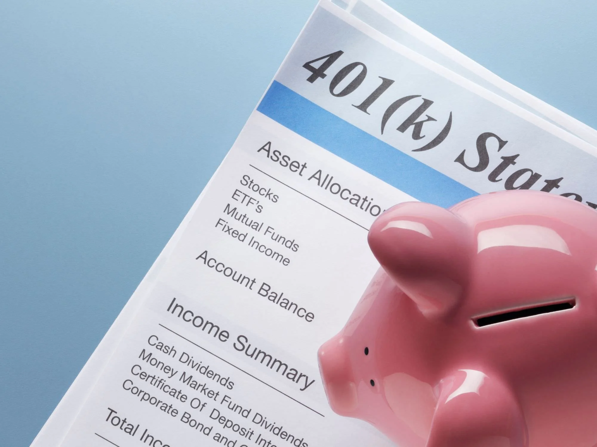 401 statement with a pink piggy bank on top