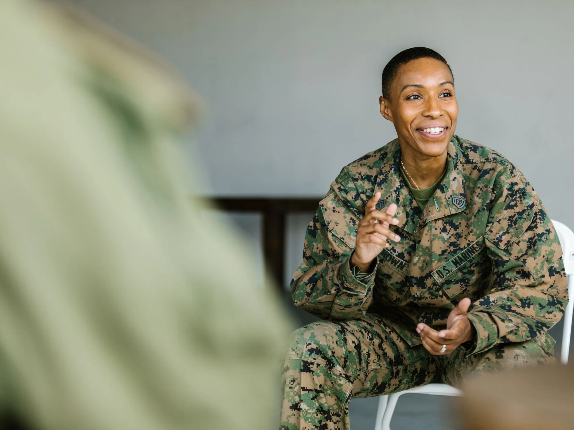Woman in the military smiling - Military Pension Divorce