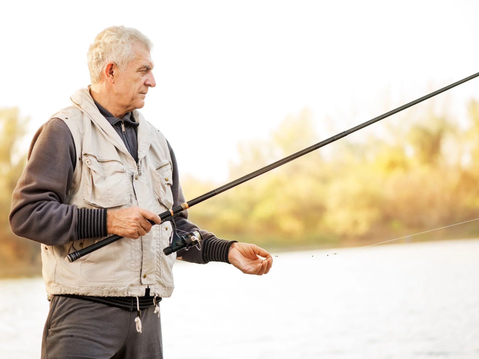 older man fishing - Divorced Spouse Social Security Benefits