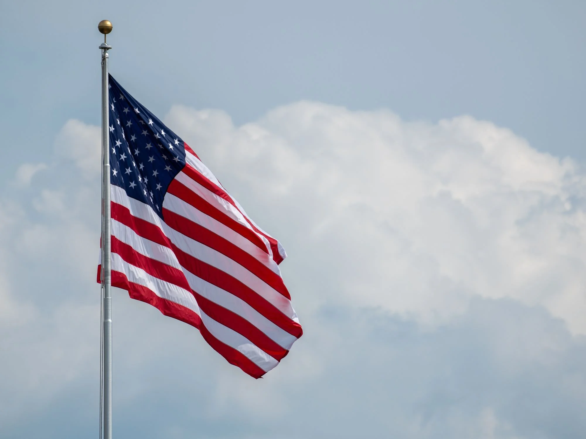 American flag flying - Military Pension Divorce
