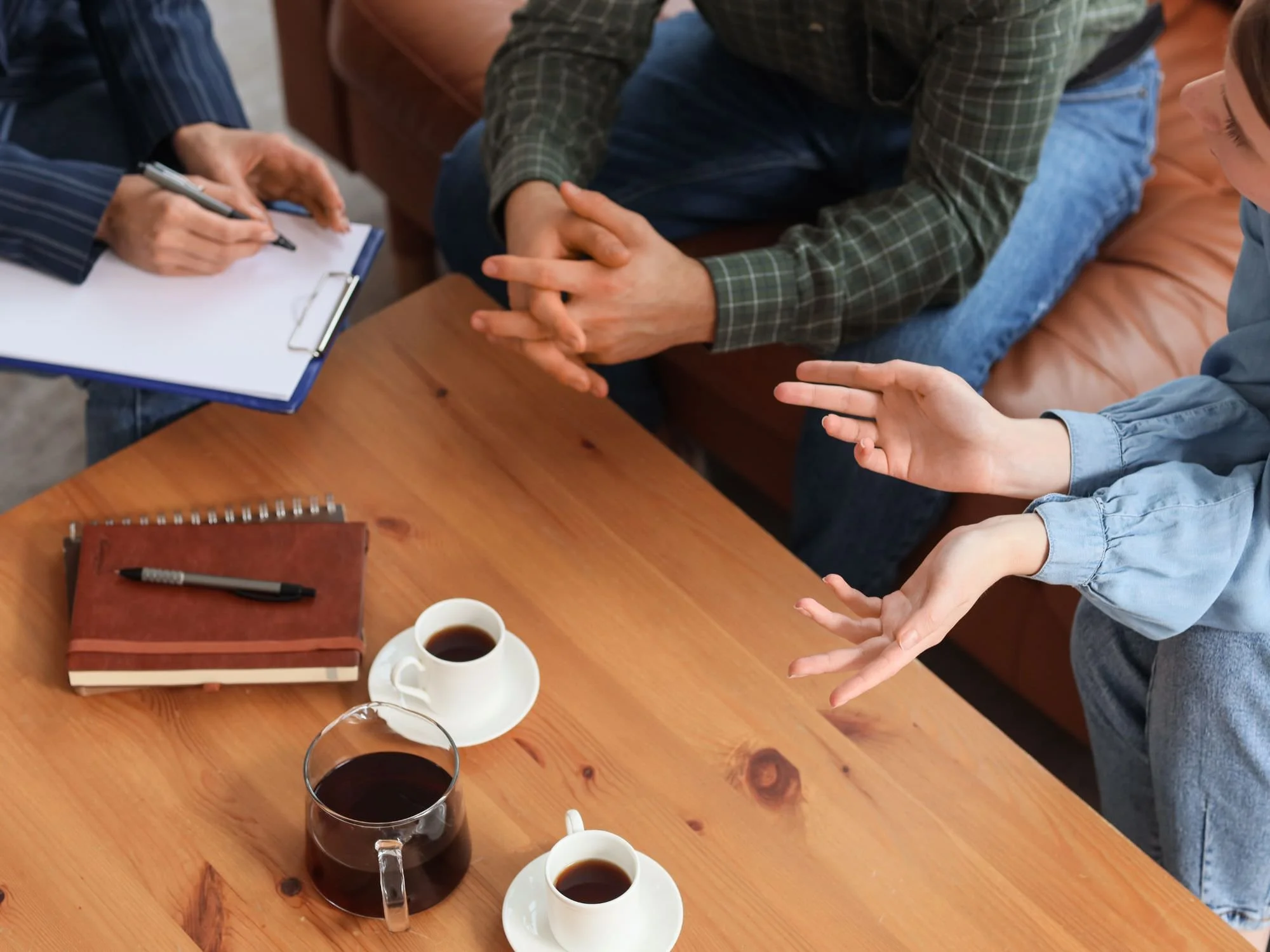 People drinking coffee in a counseling session  - ira divorce
