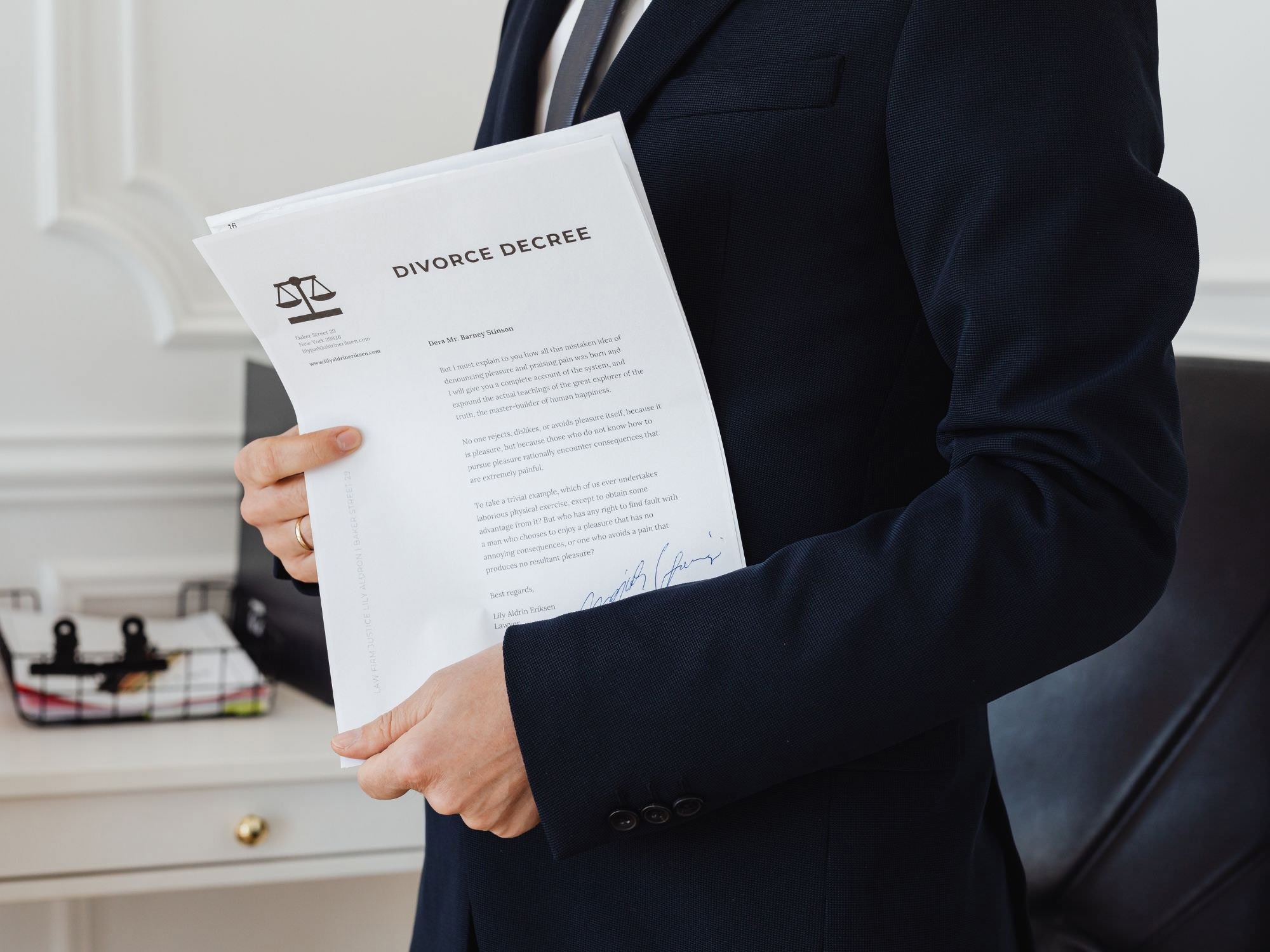 man holding divorce decree - Dividing Assets in Divorce