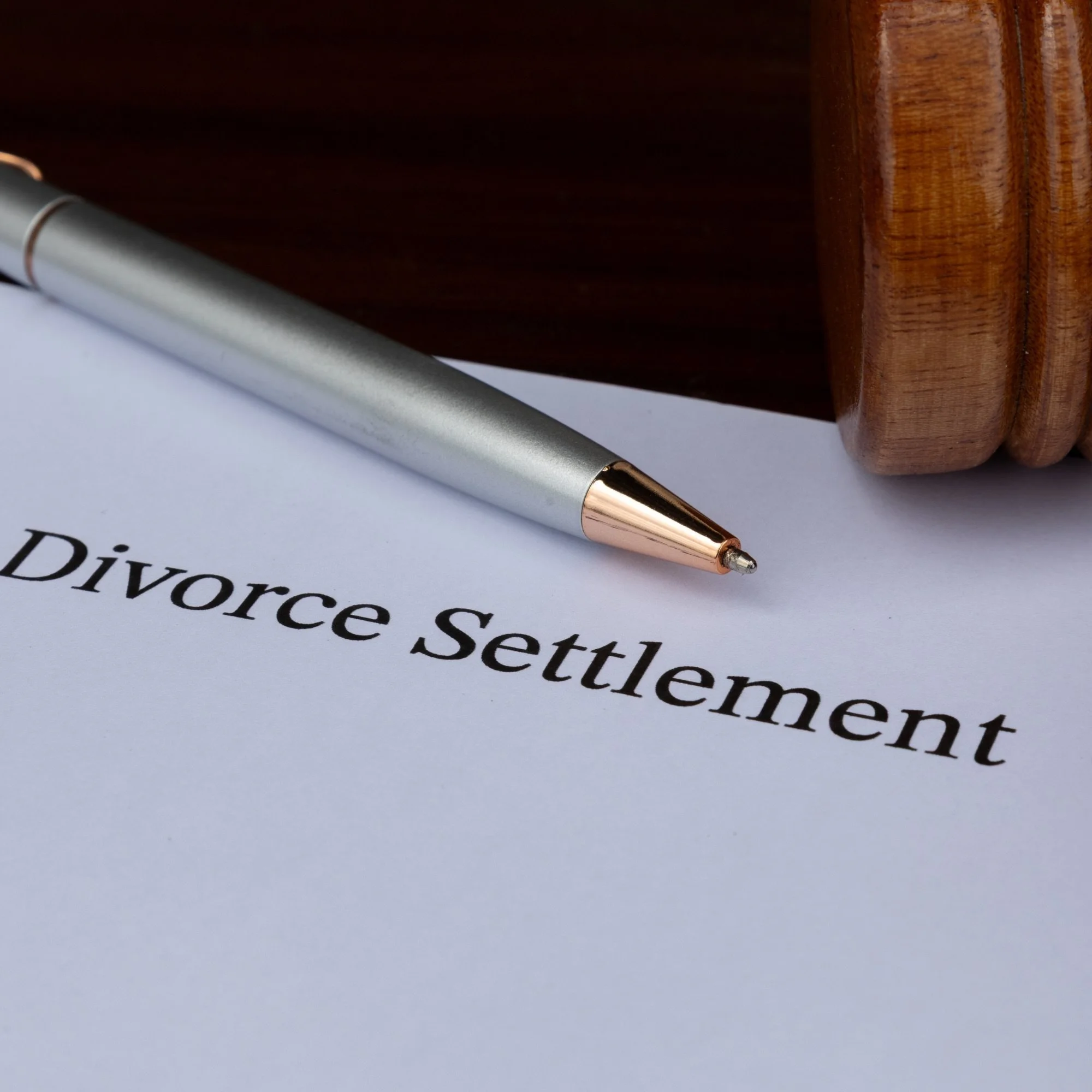 divorce settlement verbiage with a pen