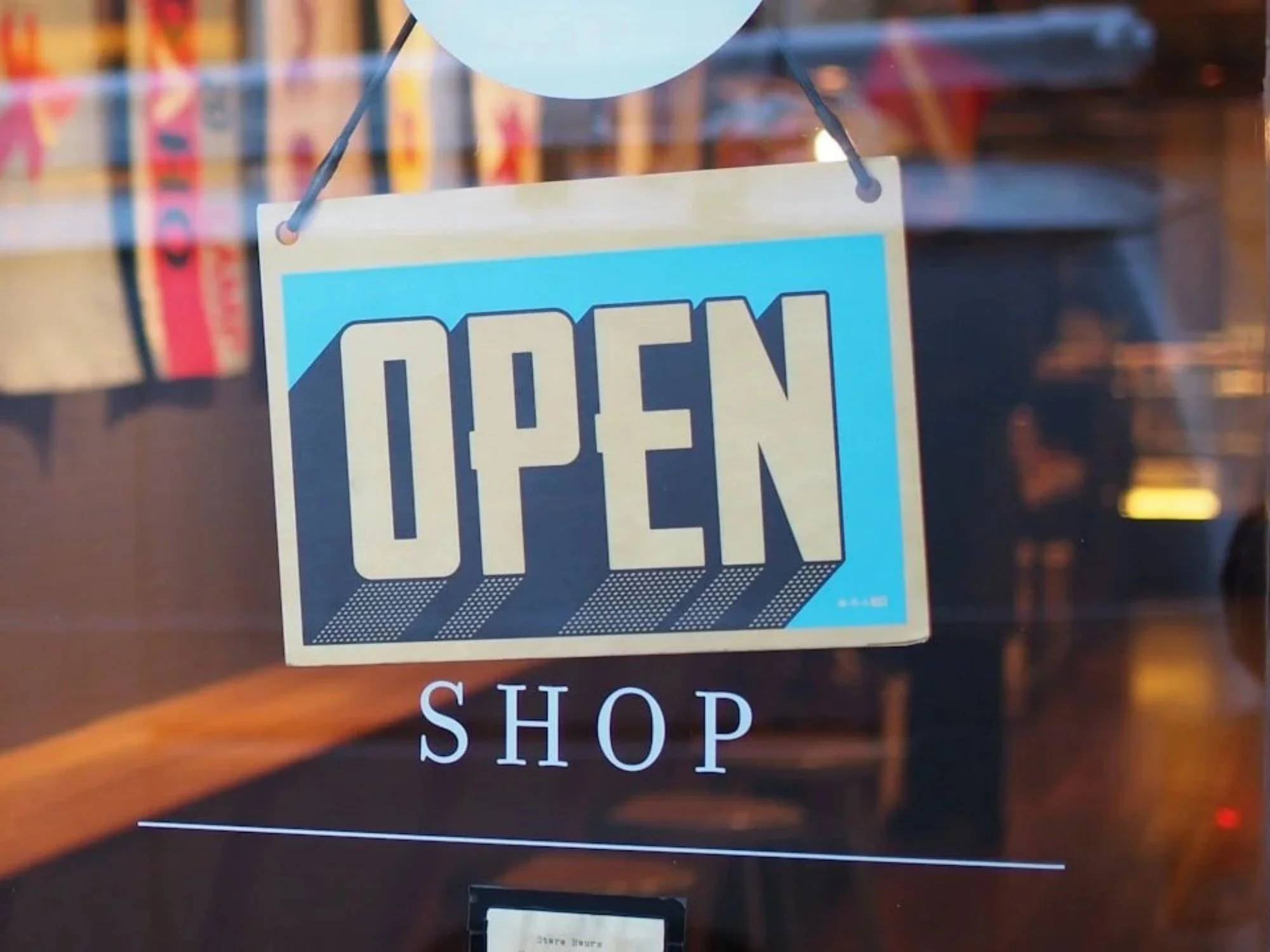 open sign on door - Financial Planning for Atlanta Business Owners
