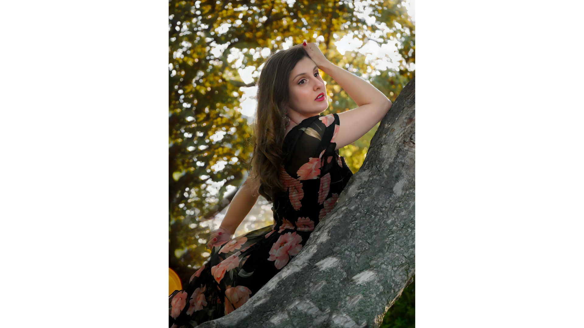 A profile photo of April in a tree